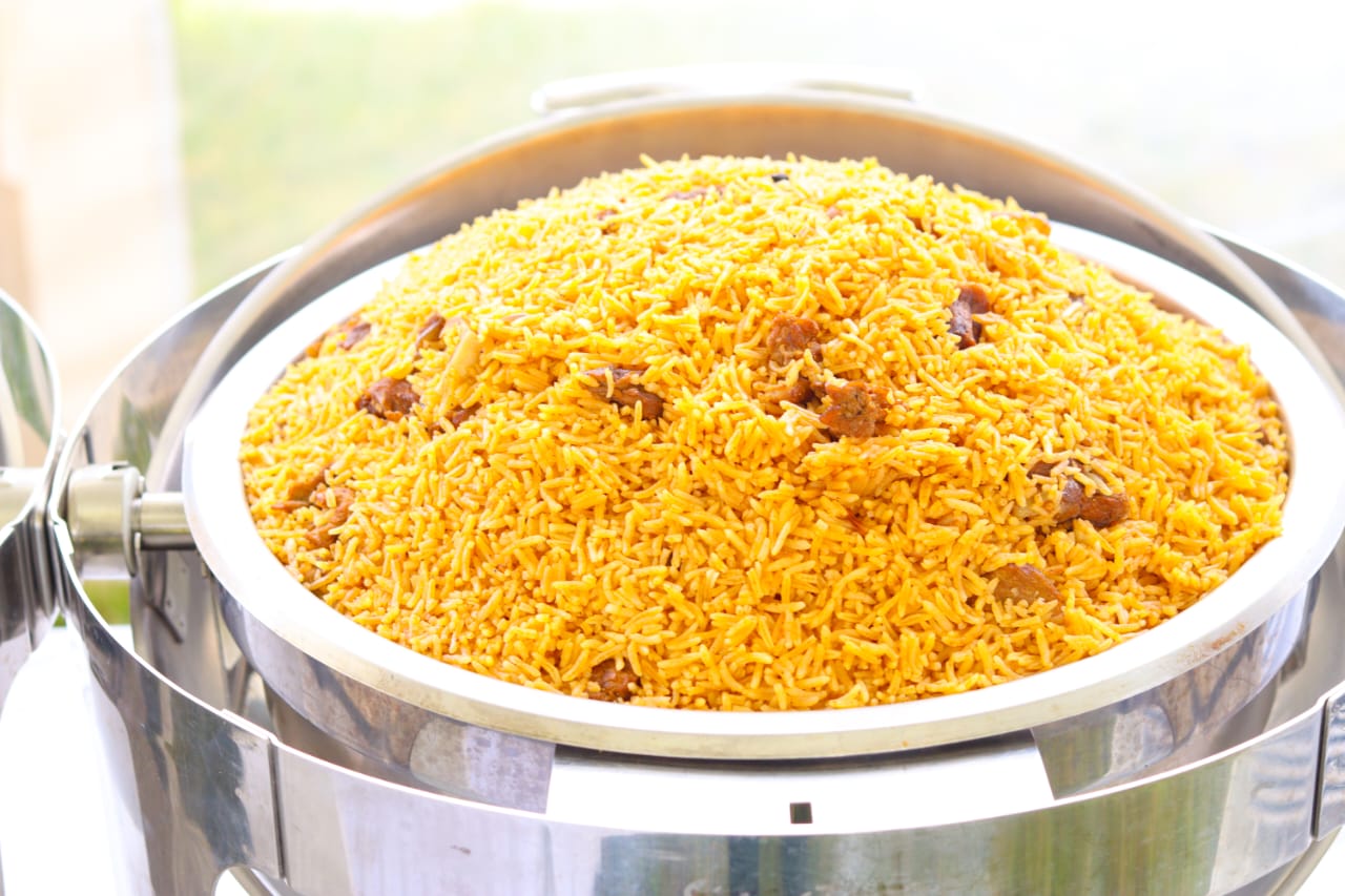 Spiced rice served in a buffet chafing dish